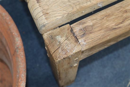 Gaze Burvill. An oak garden table, bench, low bench and pair of chairs Table L.170cm, Bench L.210cm, Low bench L.195cm